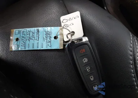 2016 Ford Escape Titanium z USA, uszkodzony, nr VIN 1FMCU9J97GUC36498